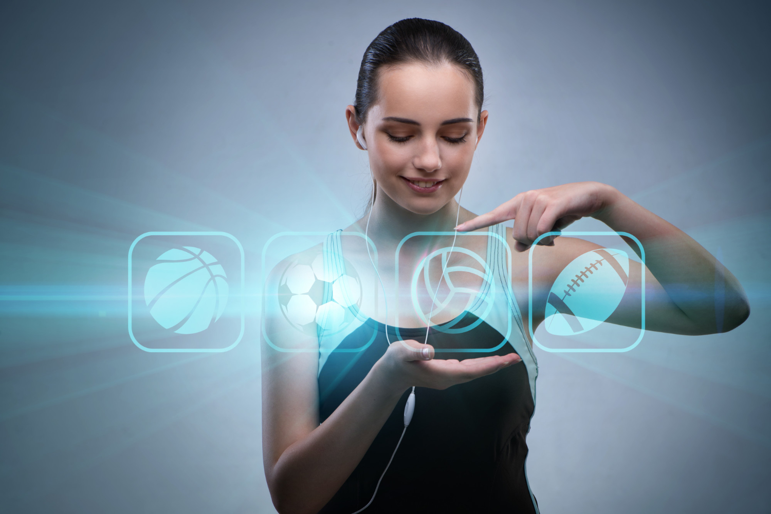 Mujer seleccionando hologramas deportivos